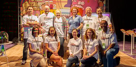 Photo of group of volunteers with Math Fair shirts.